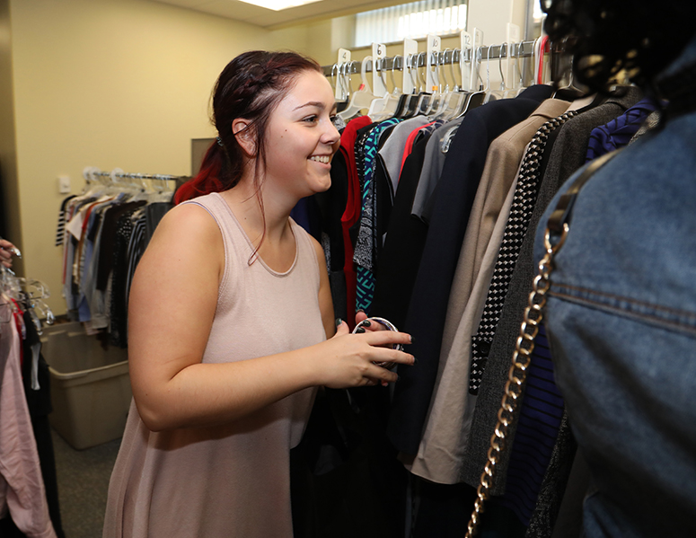  Tara Lafferty, senior, Cal U, at the "Campus Closet" event in the Career and Professional Development Center, Natali Student Center, California University of Pennsylvania, Sept. 19.  The Career and Professional Development Center, in collaboration with Dress For Success-Pittsburgh and Penn Commercial’s Toni and Guy Hairdressing Academy, hosted the “Campus Closet” to provide students with free professional clothing and hairstyle/makeup application.  Organizers say students gain confidence and learn how to dress professionally, in addition to getting suited for free professional clothing, in this fun, supportive atmosphere.      